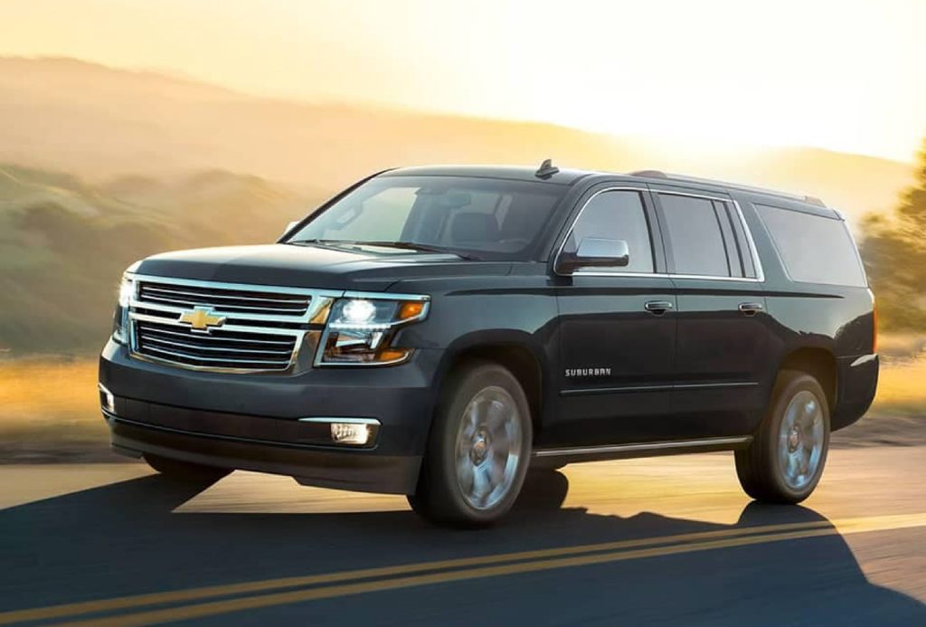 A clicked picture captures a Chevrolet Suburban running swiftly along the open road.